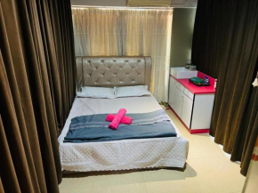 Queen room with shared bathroom